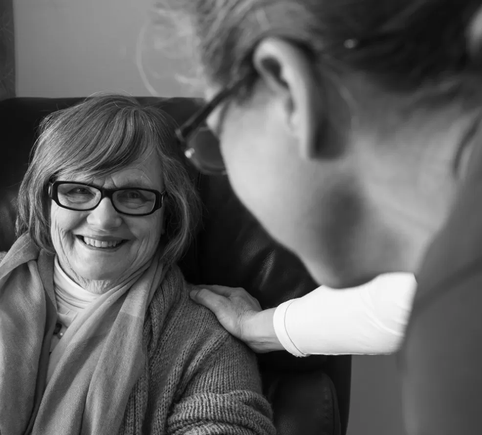 woman-patient talks to staff | HHMP medical practice