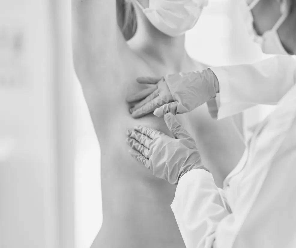 Surgeons operating in theatre