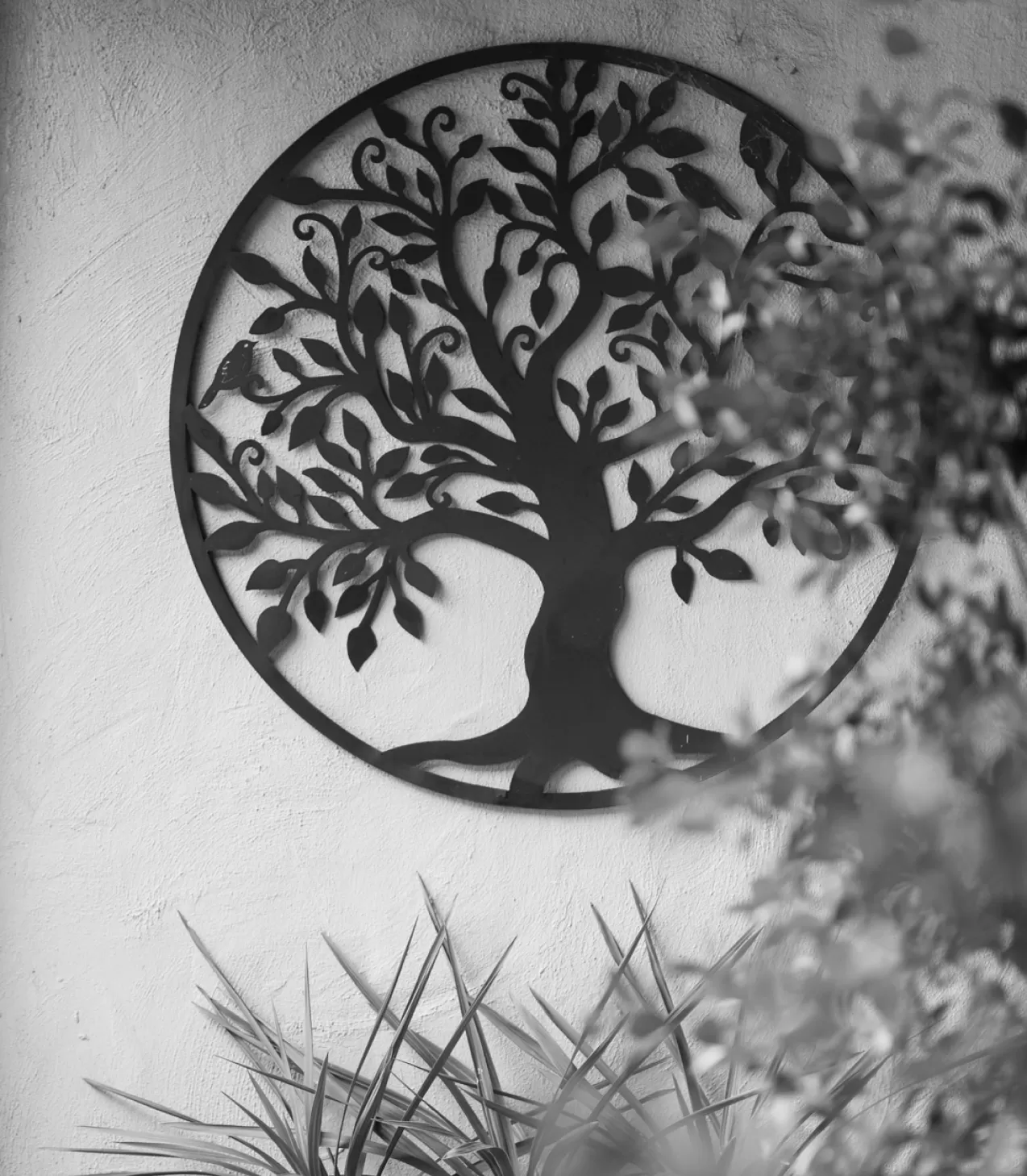 A metal tree of life wall sculpture