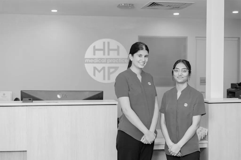 Two reception staff at the Hunters Hill Medical Practice front desk